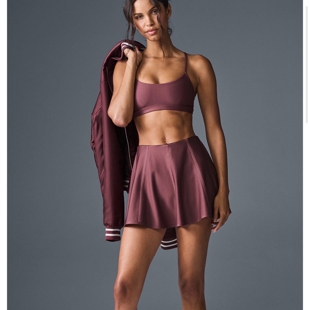 Alo new never worn with tags skirt, color looks like color on model.